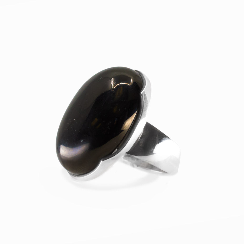 Jet oval cabochon ring in polished sterling silver featuring a smooth high-polish surface and rich glossy black coloring.