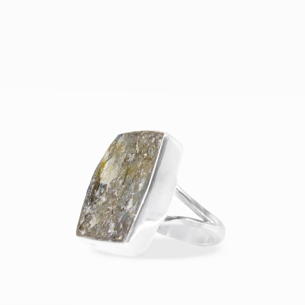 Rectangular Labradorite ring with earthy gray, gold, and blue-green flashes, polished sterling silver bezel setting, and split band.