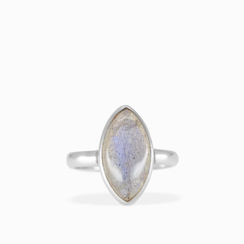 Marquise Labradorite ring with translucent gray gemstone, delicate blue flashes, natural inclusions, and polished sterling silver bezel setting.