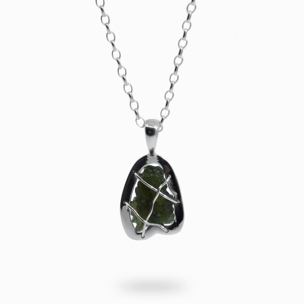 Raw Moldavite necklace in a cage