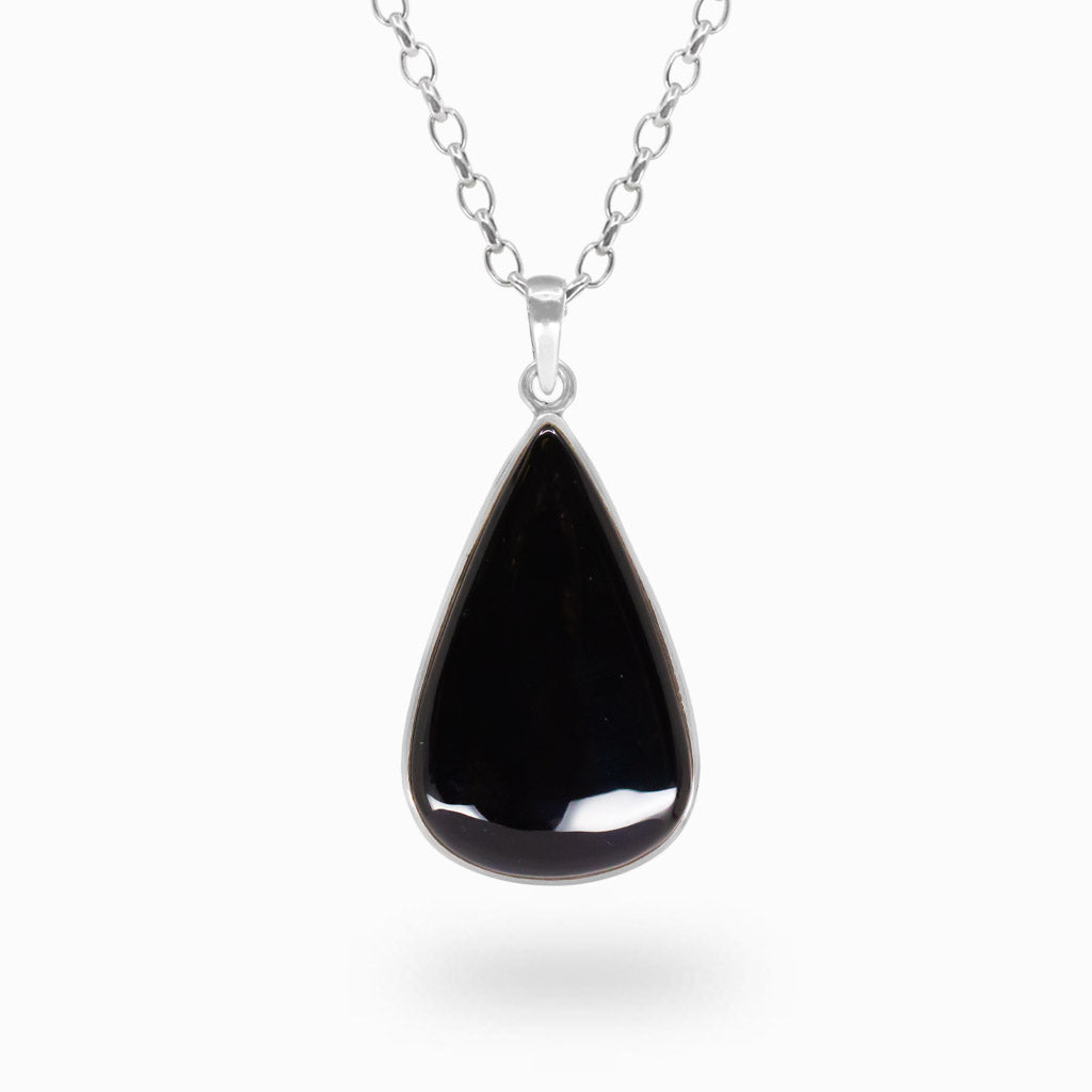 Pear-shaped glossy Black Onyx cabochon pendant in a polished 925 sterling silver bezel setting.