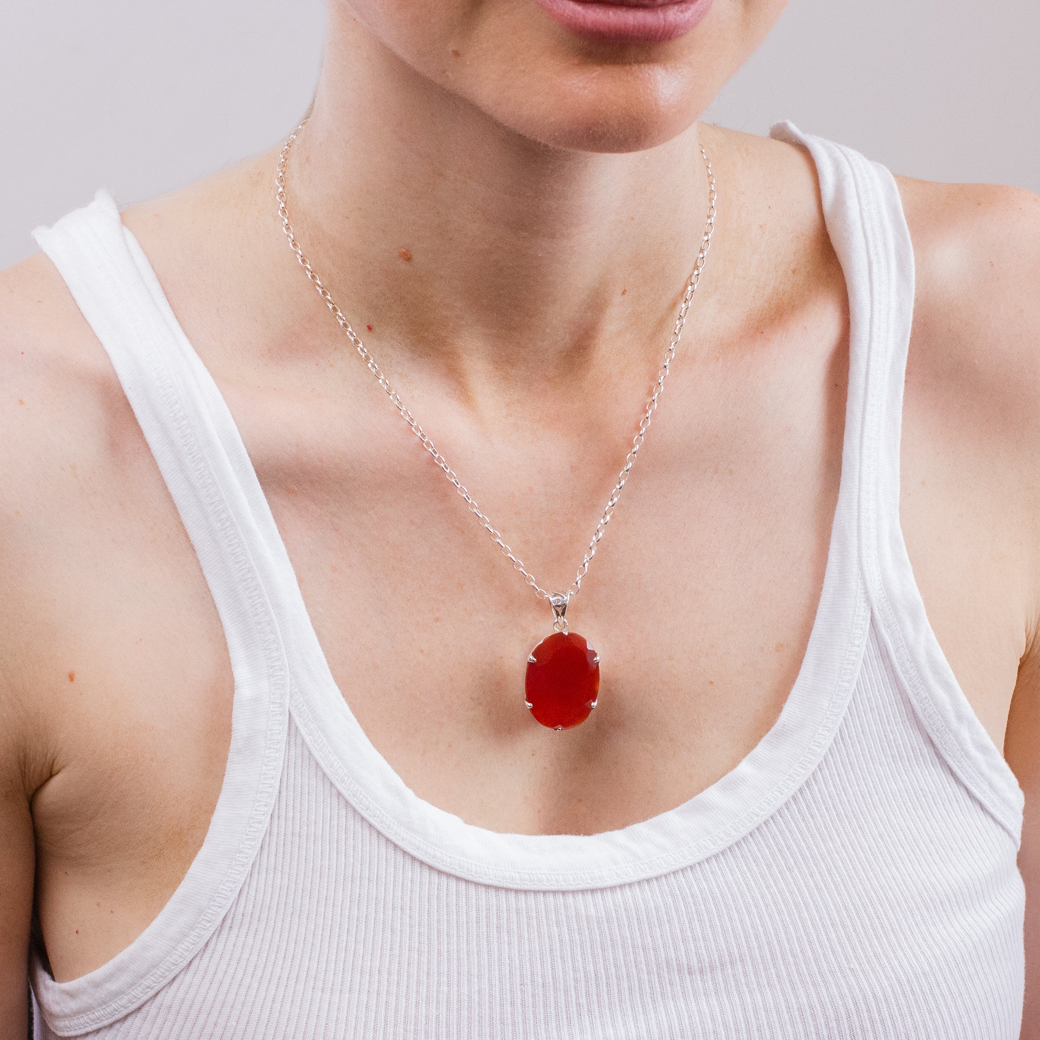 OVAL FACETED CARNELIAN NECKLACE ON MODEL
