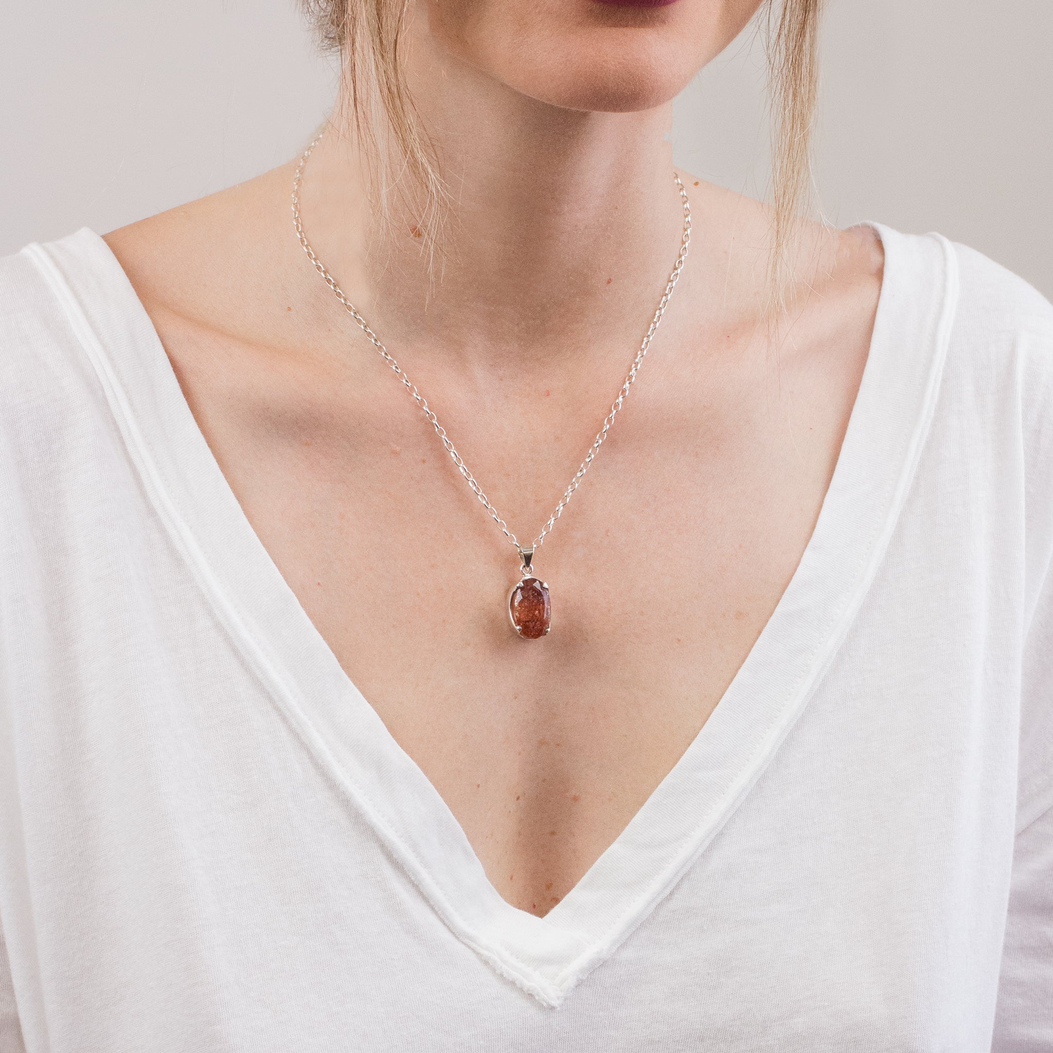 FACETED SUNSTONE NECKLACE ON MODEL