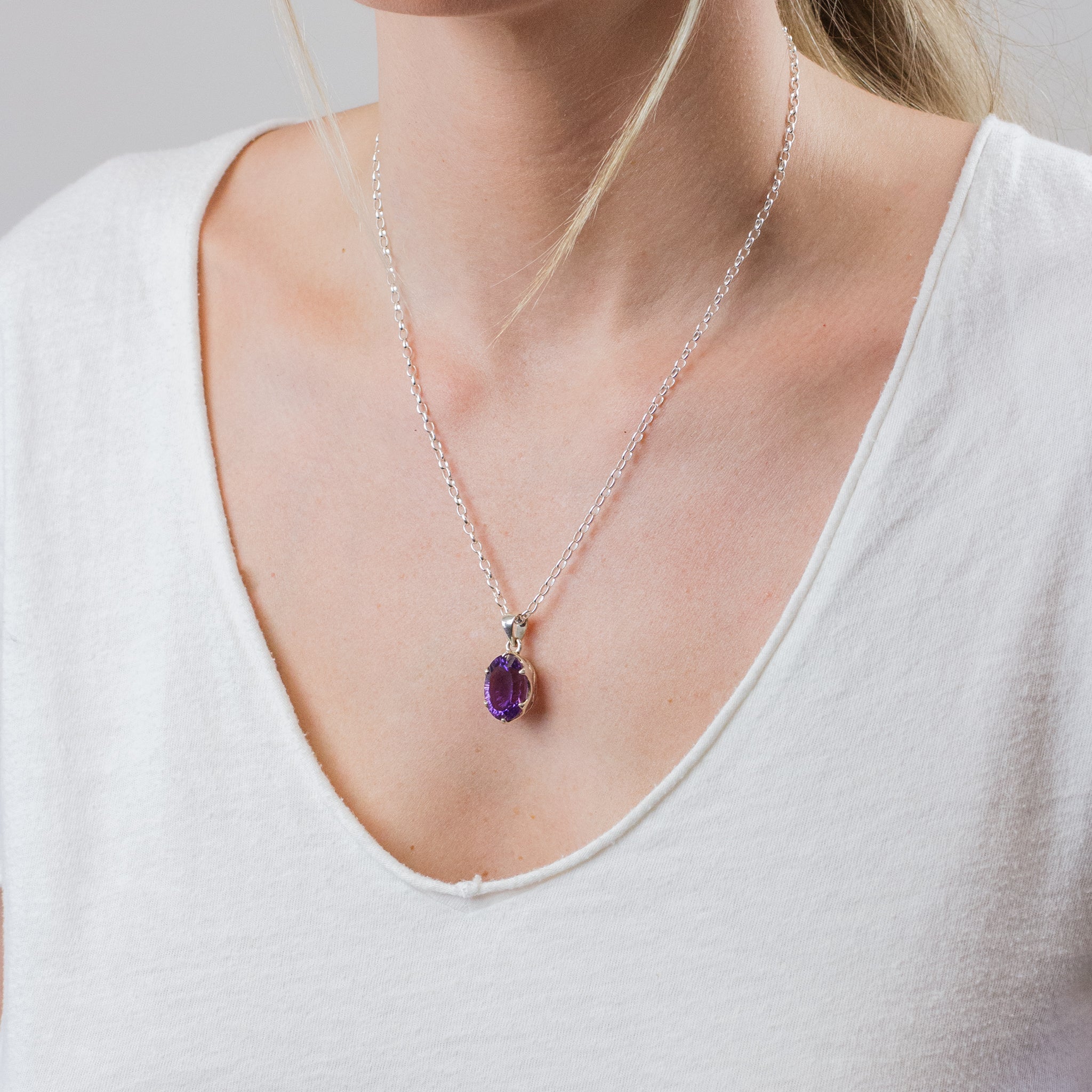 FACETED OVAL AMETHYST NECKLACE ON MODEL