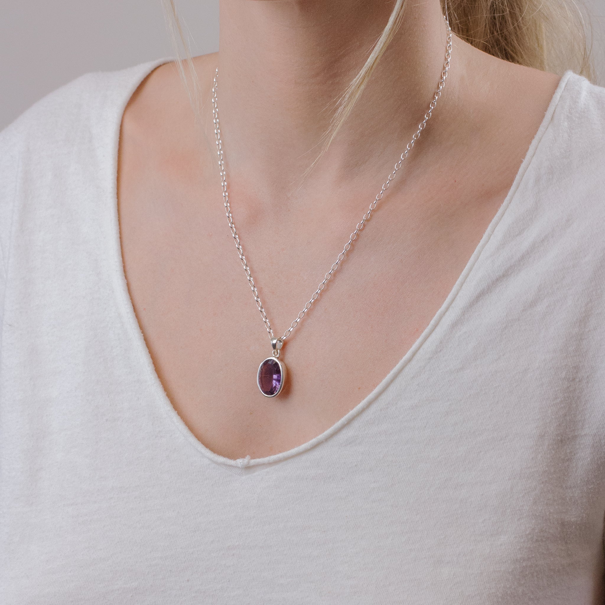 FACETED OVAL AMETHYST NECKLACE ON MODEL