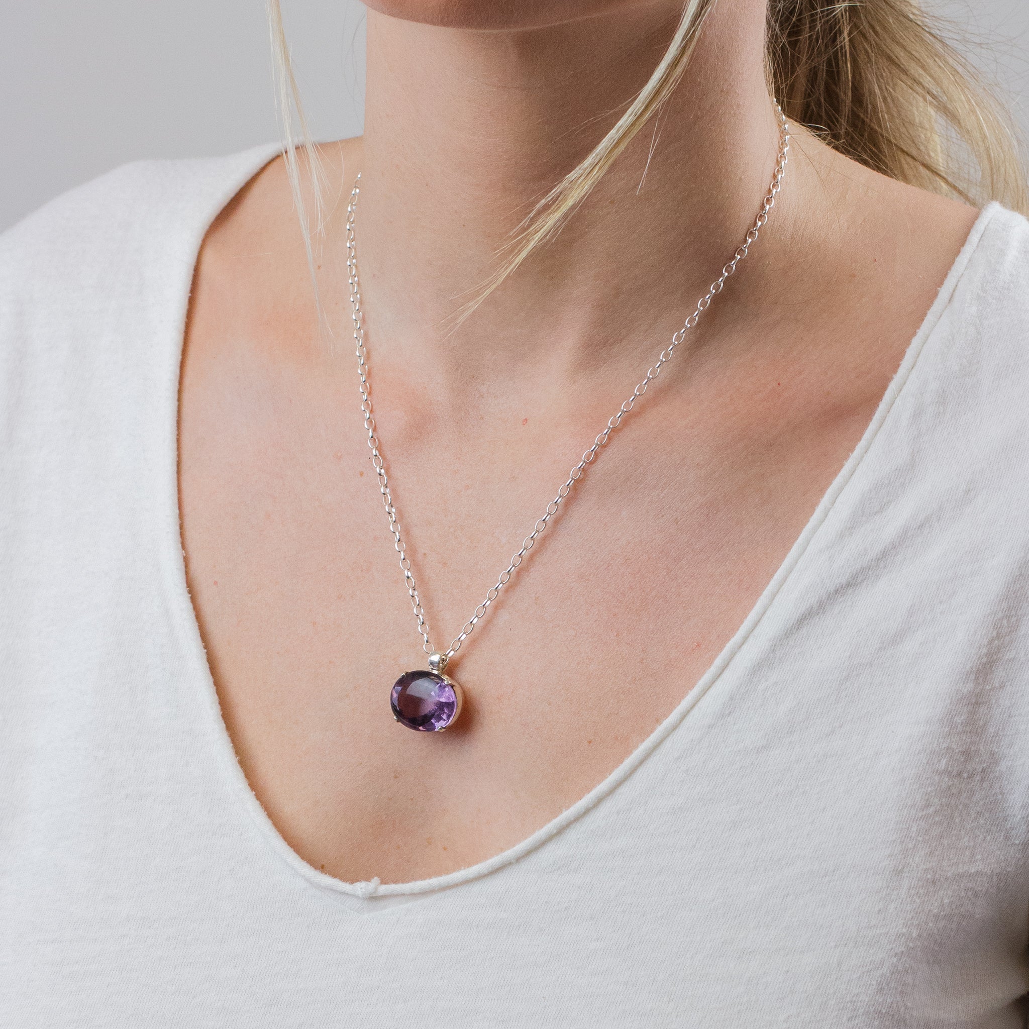 FACETED OVAL AMETHYST NECKLACE ON MODEL