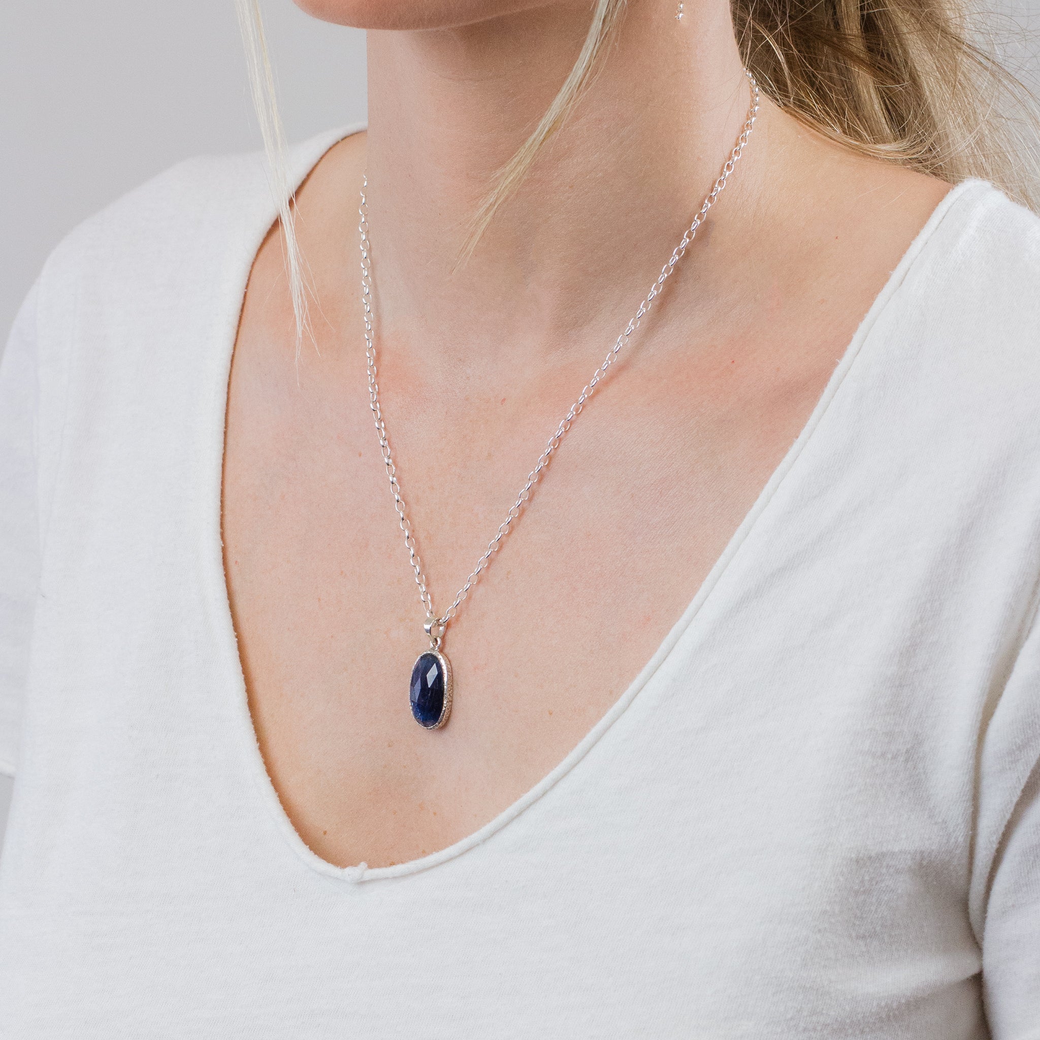 FACETED OVAL BLUE KYANITE NECKLACE ON MODEL