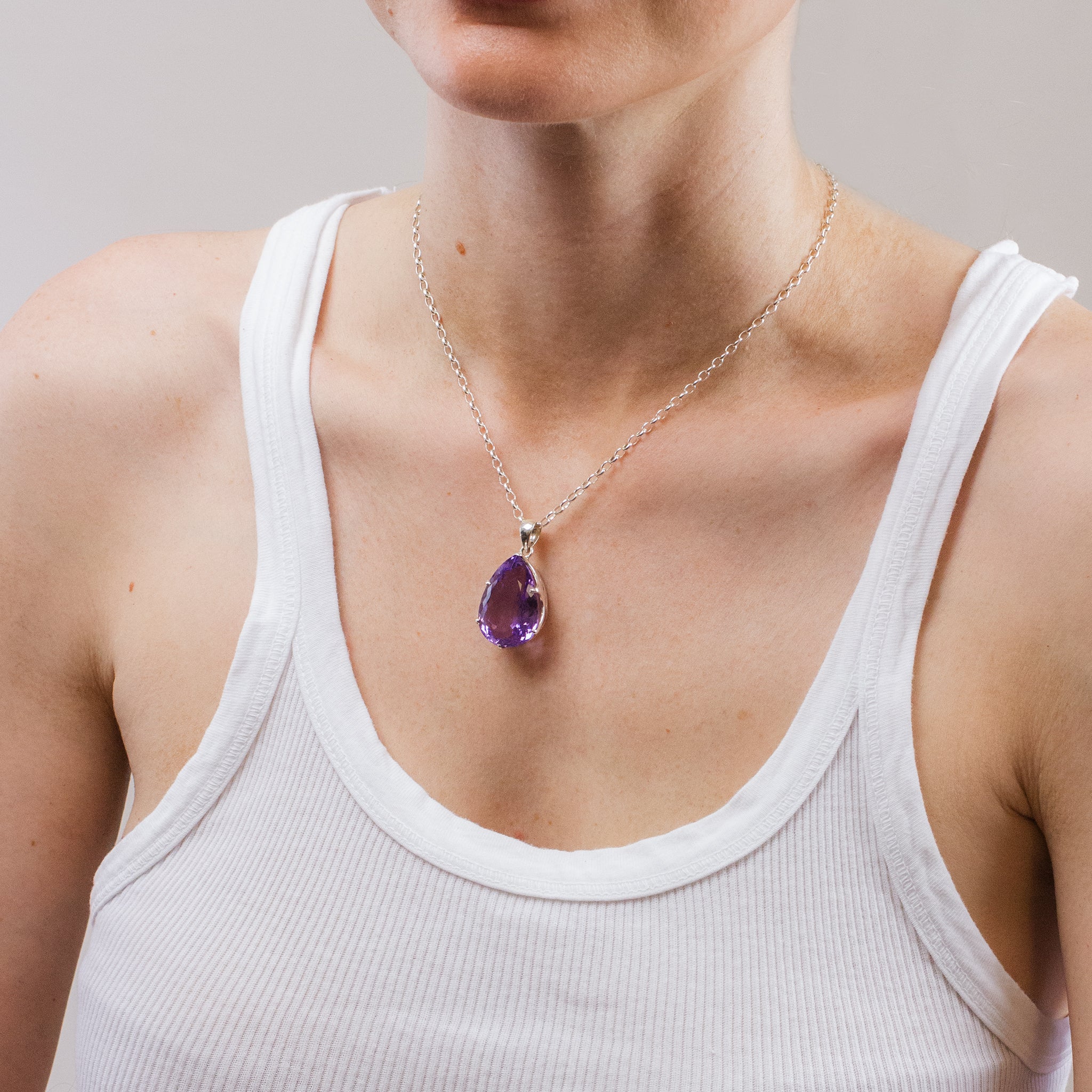 FACETED AMETHYST TEAR NECKLACE ON MODEL