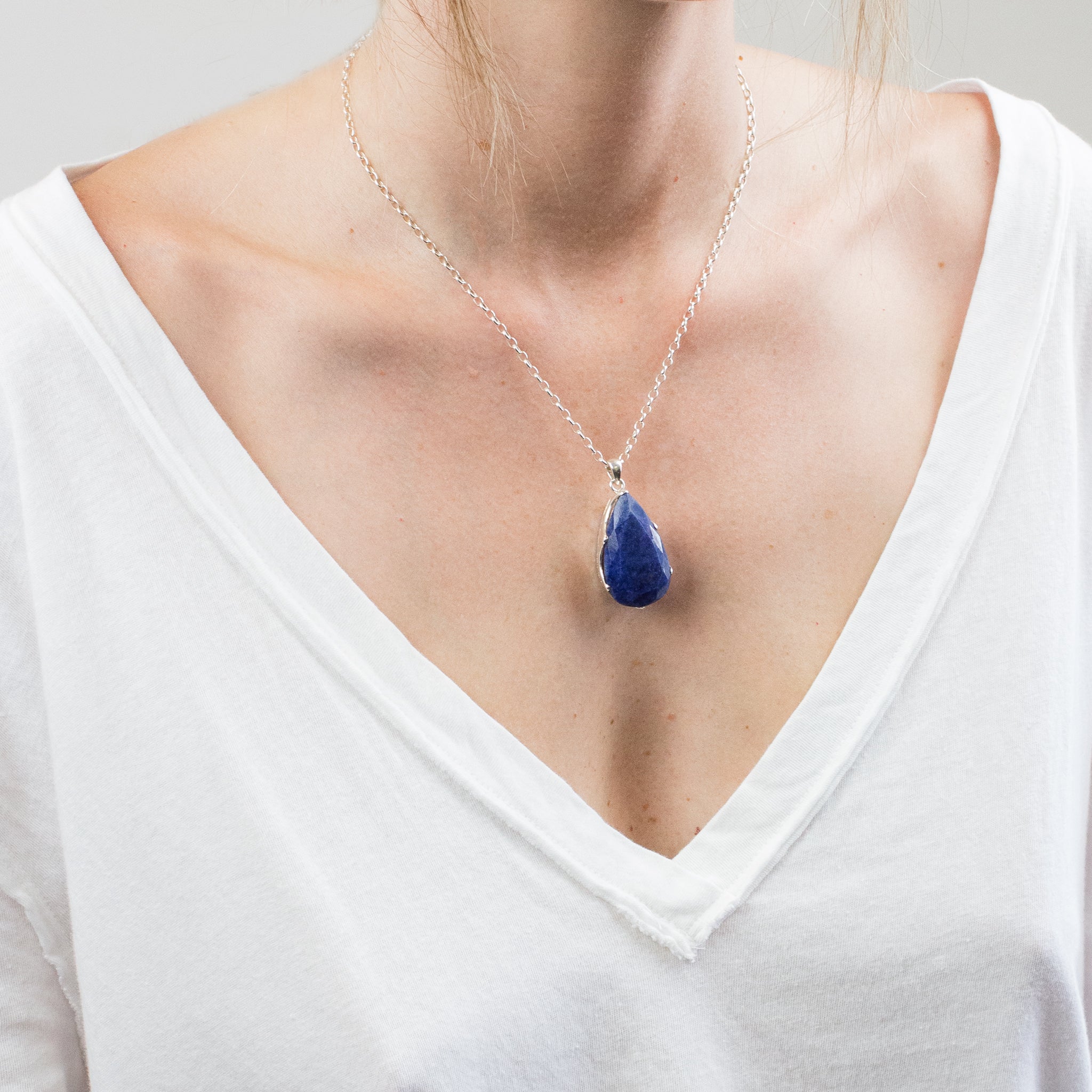 FACETED SODALITE TEAR NECKLACE ON MODEL