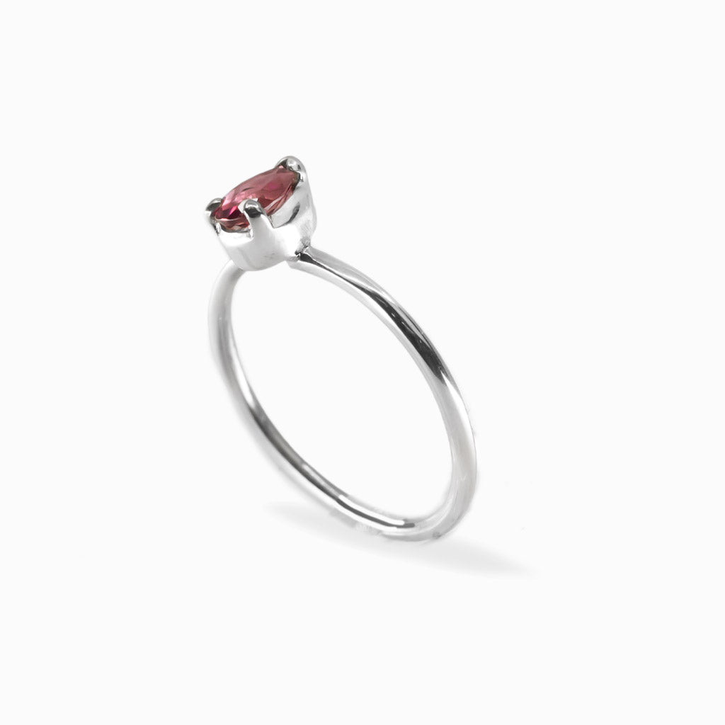 Pear-shaped faceted Pink Tourmaline ring in polished 925 sterling silver with a three-prong setting and slender silver band.