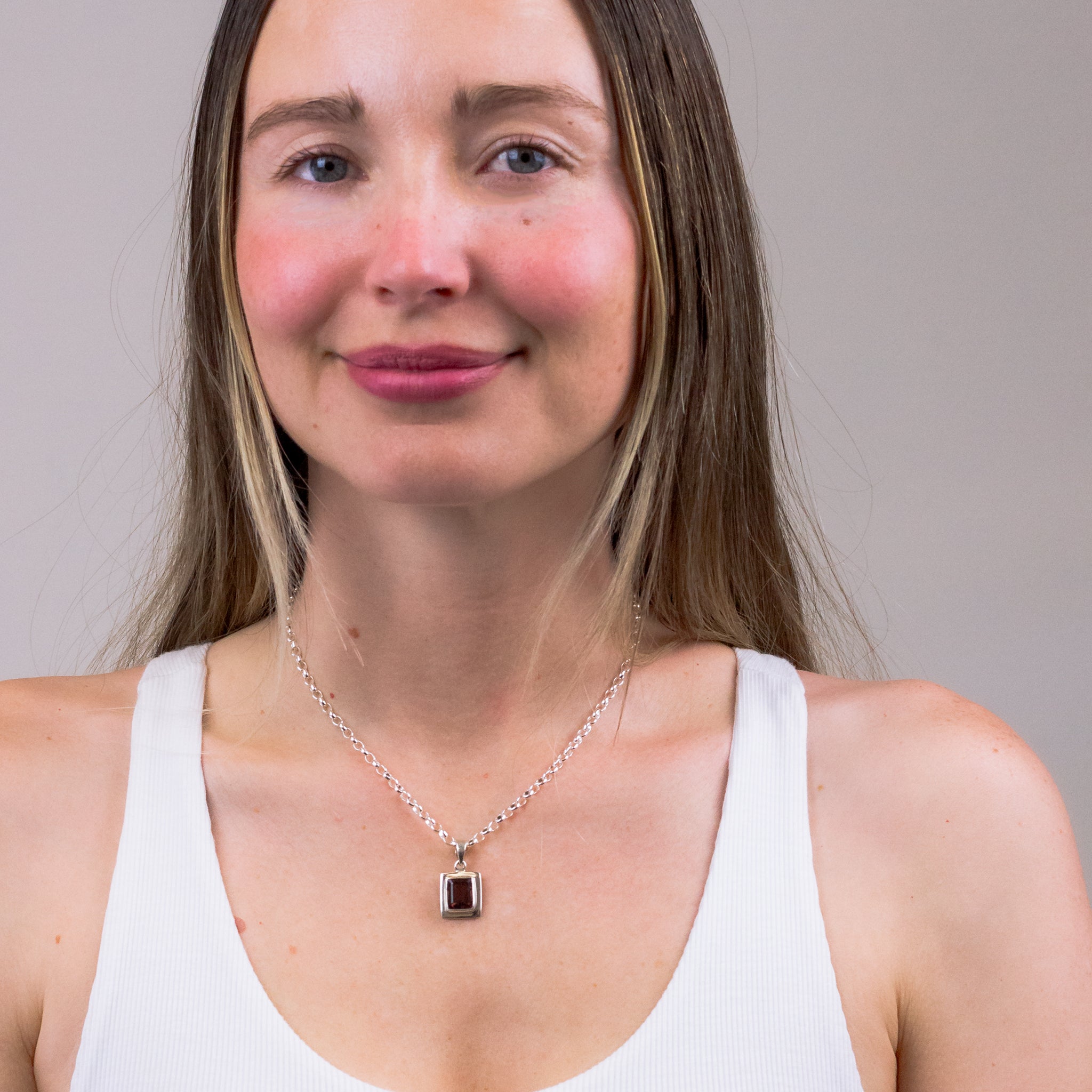 FACETED RECTANGULAR PINK TOURMALINE NECKLACE ON MODEL