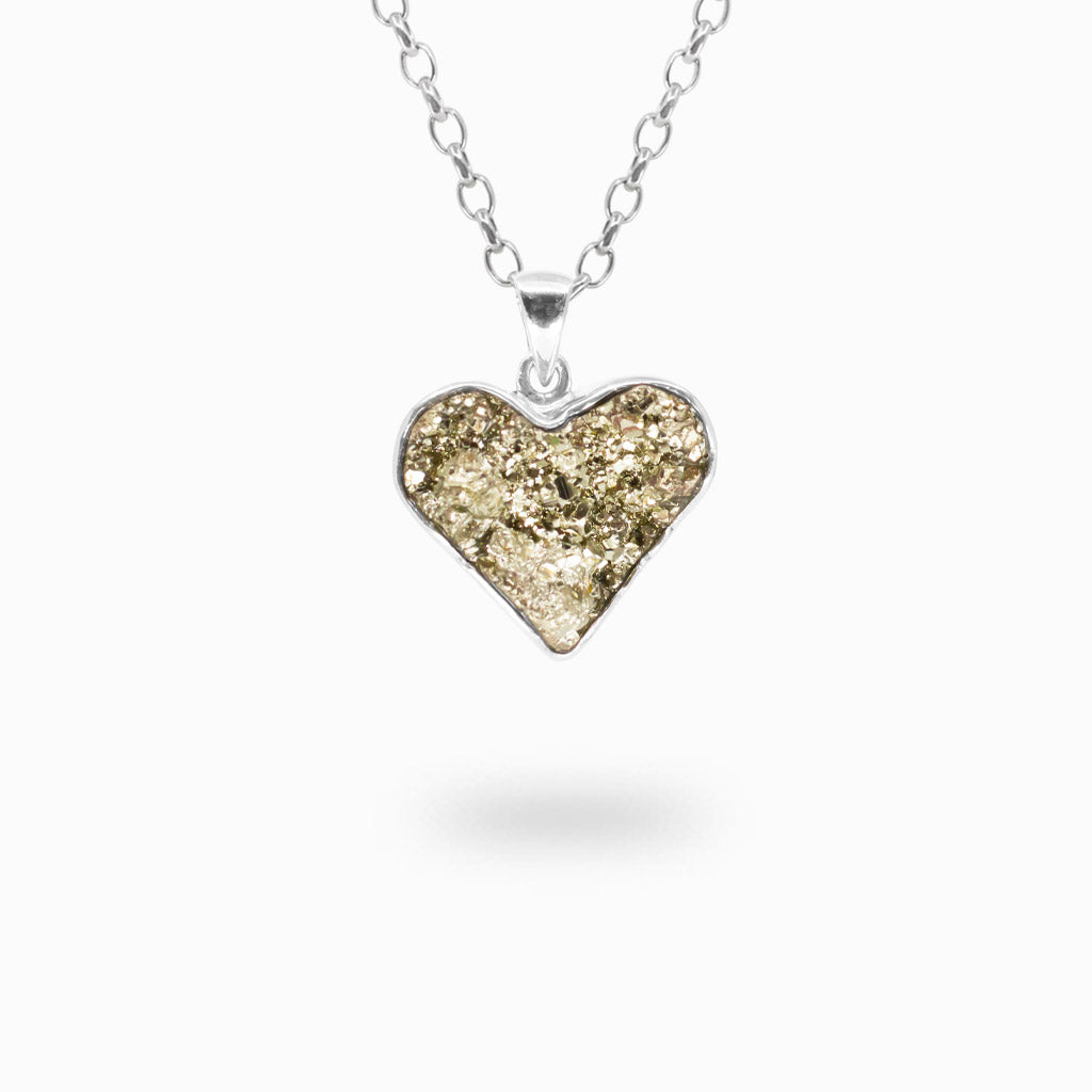 Heart-shaped golden Pyrite pendant with sparkling natural metallic crystal clusters in a polished 925 sterling silver bezel setting.