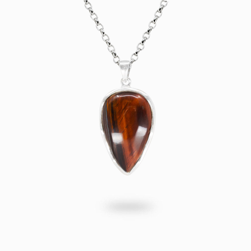 Pear-shaped reddish-brown Red Tiger Eye pendant set in polished 925 sterling silver.