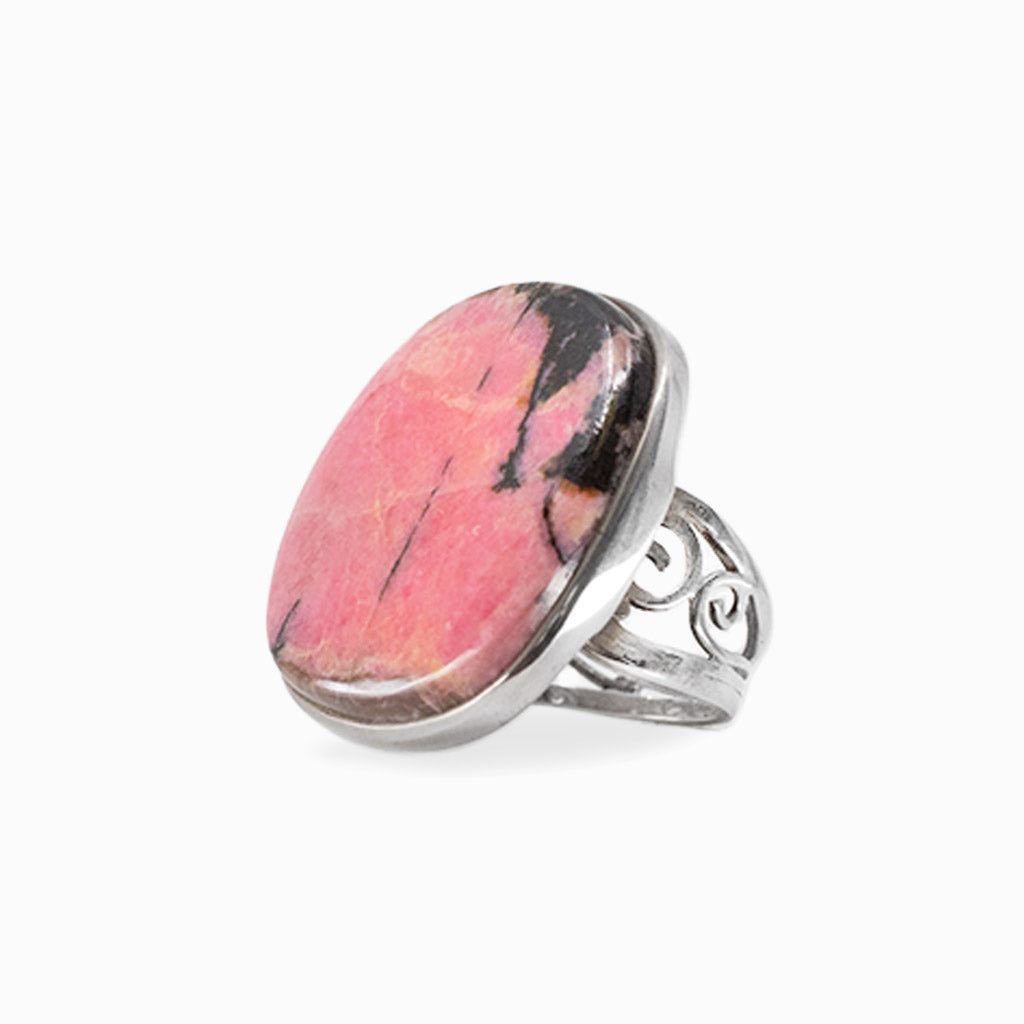 Cushion-shaped pink Rhodonite cabochon with natural dark veining set in 925 sterling silver.