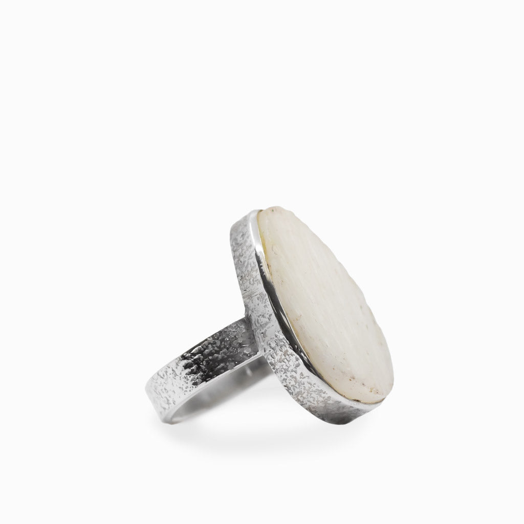 Teardrop Scolecite cabochon sterling silver statement ring with silky natural fibers.