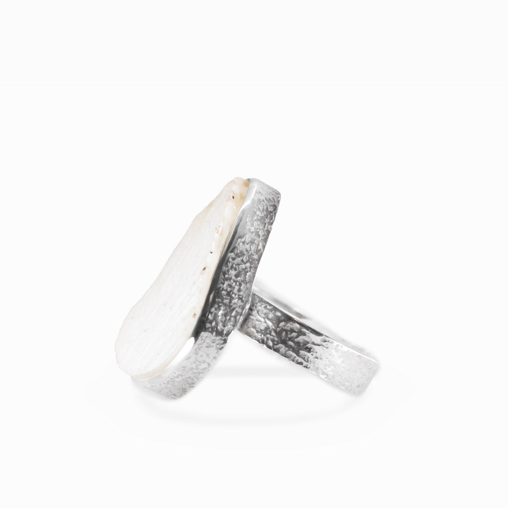 Teardrop Scolecite cabochon sterling silver statement ring with silky natural fibers.
