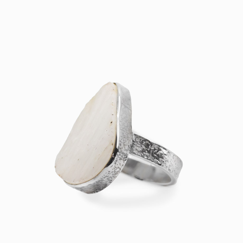 Teardrop Scolecite cabochon sterling silver statement ring with silky natural fibers.