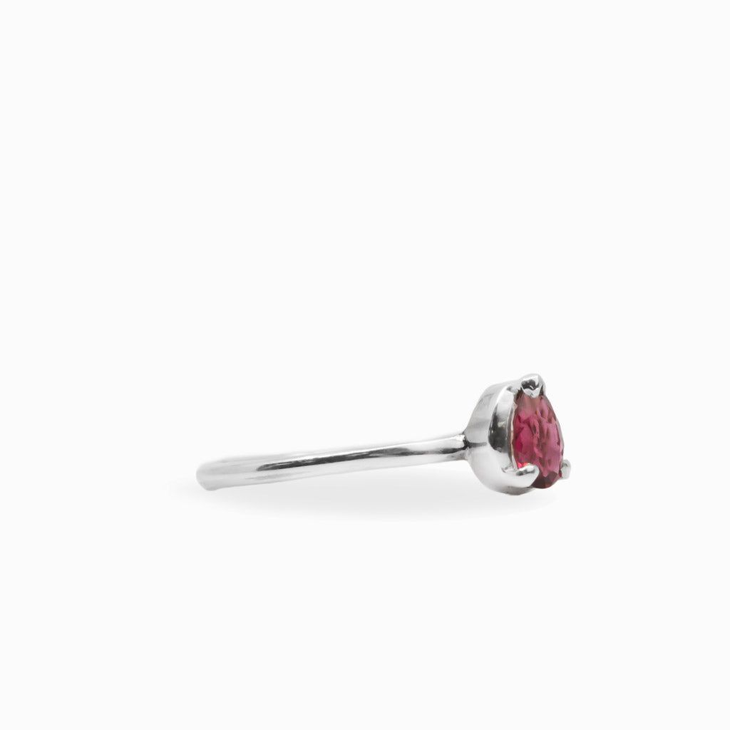 Pear-shaped faceted Pink Tourmaline ring in polished 925 sterling silver with a three-prong setting and slender silver band.