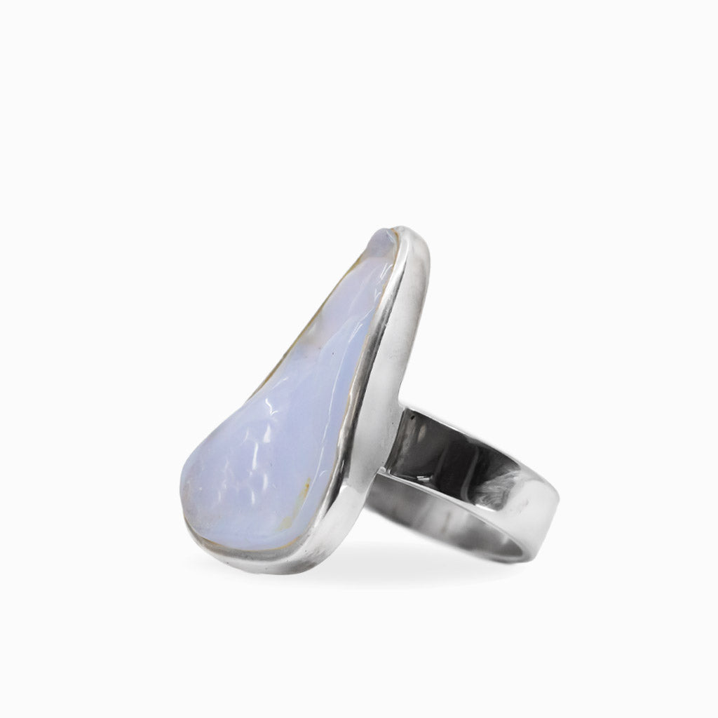 Elongated freeform blue-lavender Botryoidal Chalcedony ring in a polished 925 sterling silver bezel setting.
