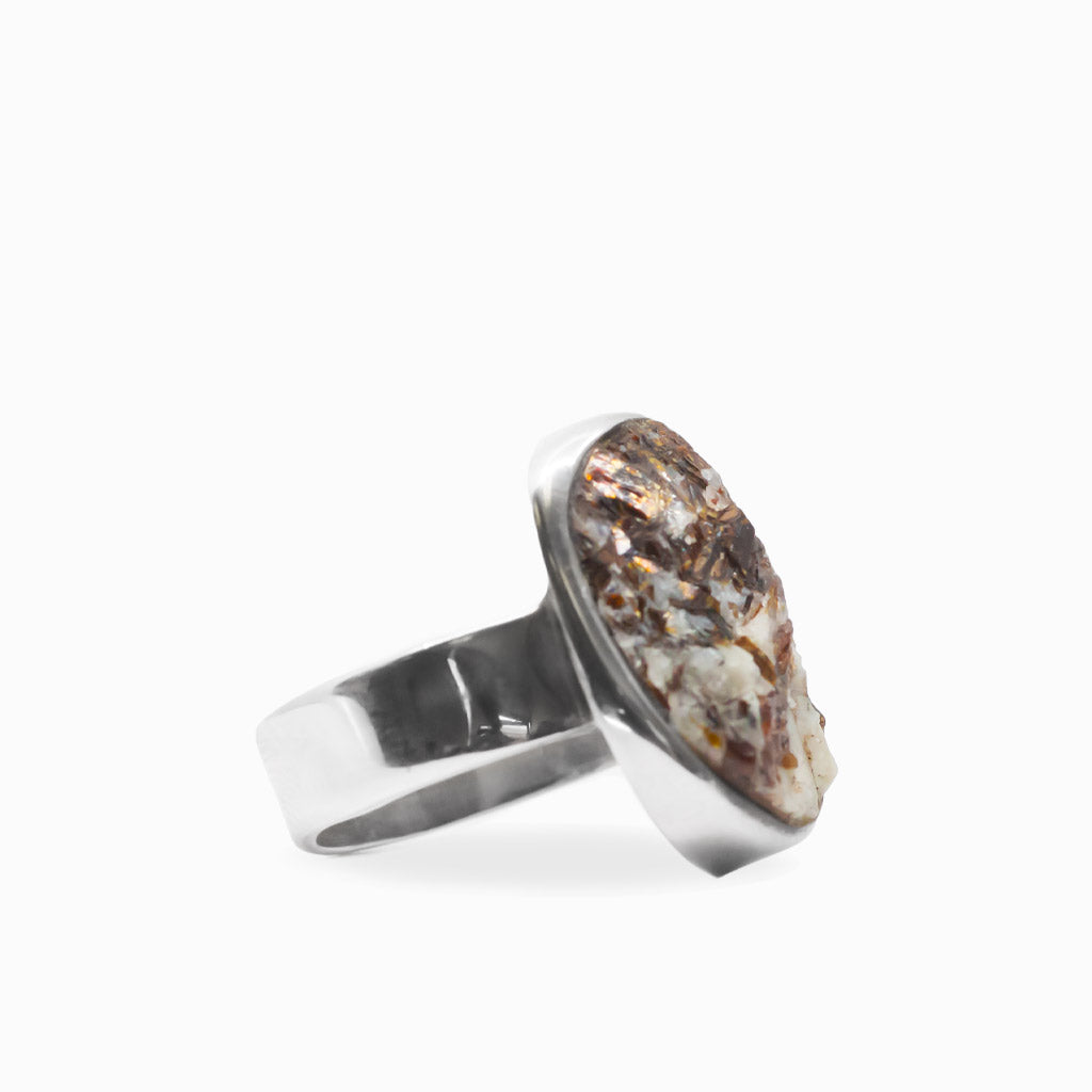 Freeform oval Astrophyllite ring with bronze, cream and metallic formations set in polished 925 sterling silver.