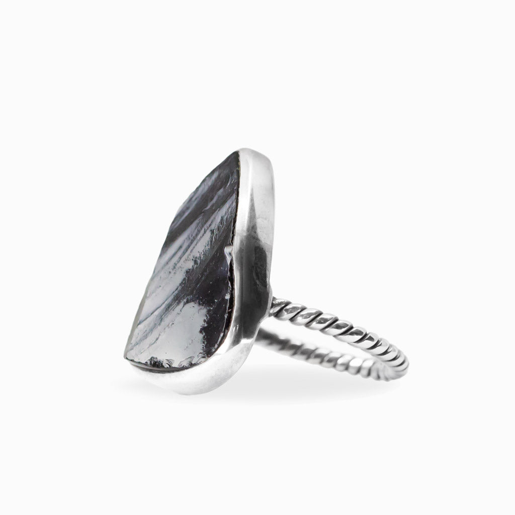 Freeform triangular Apache Obsidian ring in polished 925 sterling silver with a smooth bezel setting.