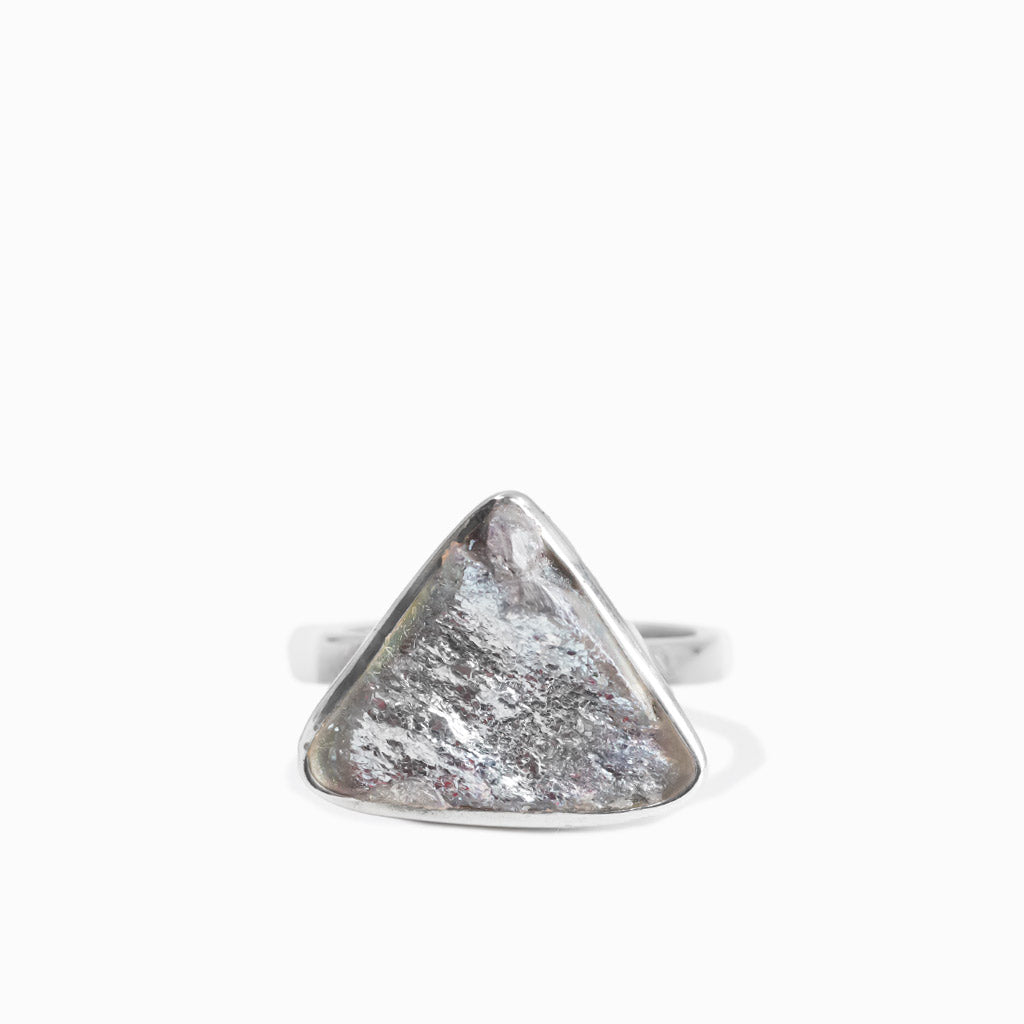 Raw specular hematite triangular ring in sterling silver bezel setting
