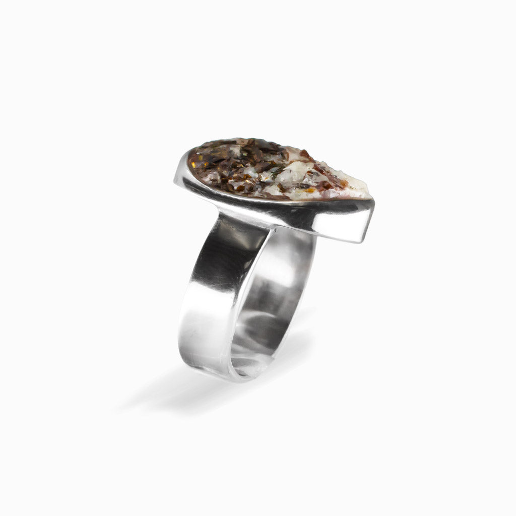 Freeform oval Astrophyllite ring with bronze, cream and metallic formations set in polished 925 sterling silver.