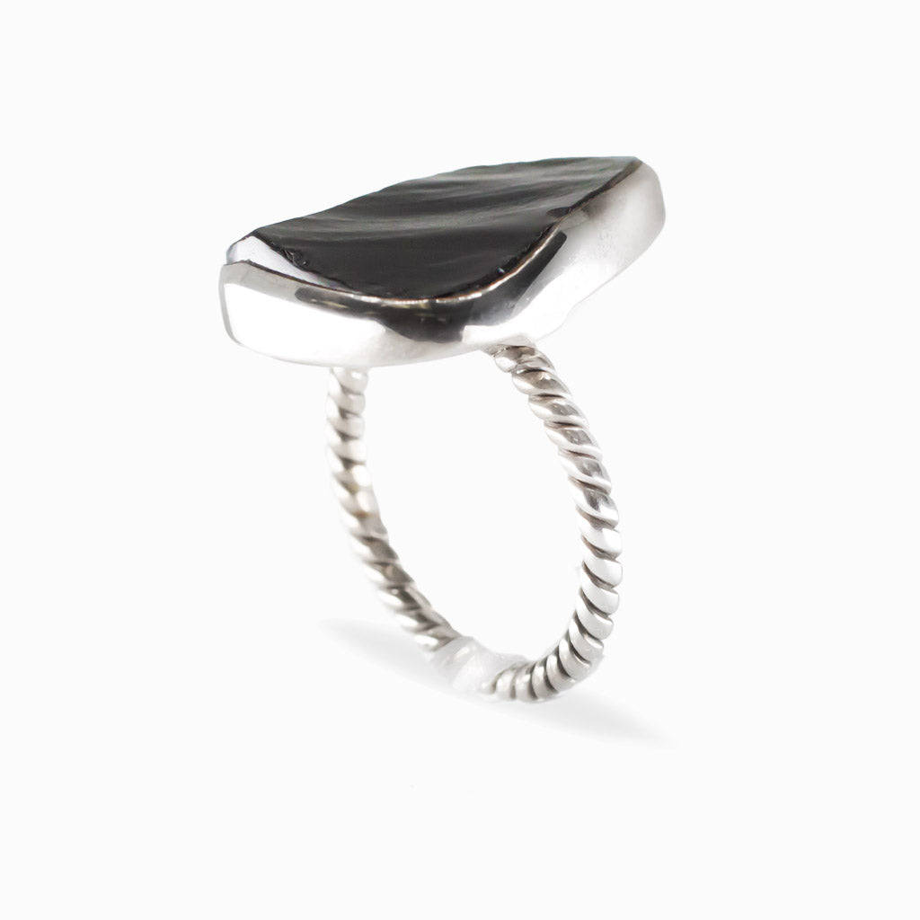 Freeform triangular Apache Obsidian ring in polished 925 sterling silver with a smooth bezel setting.