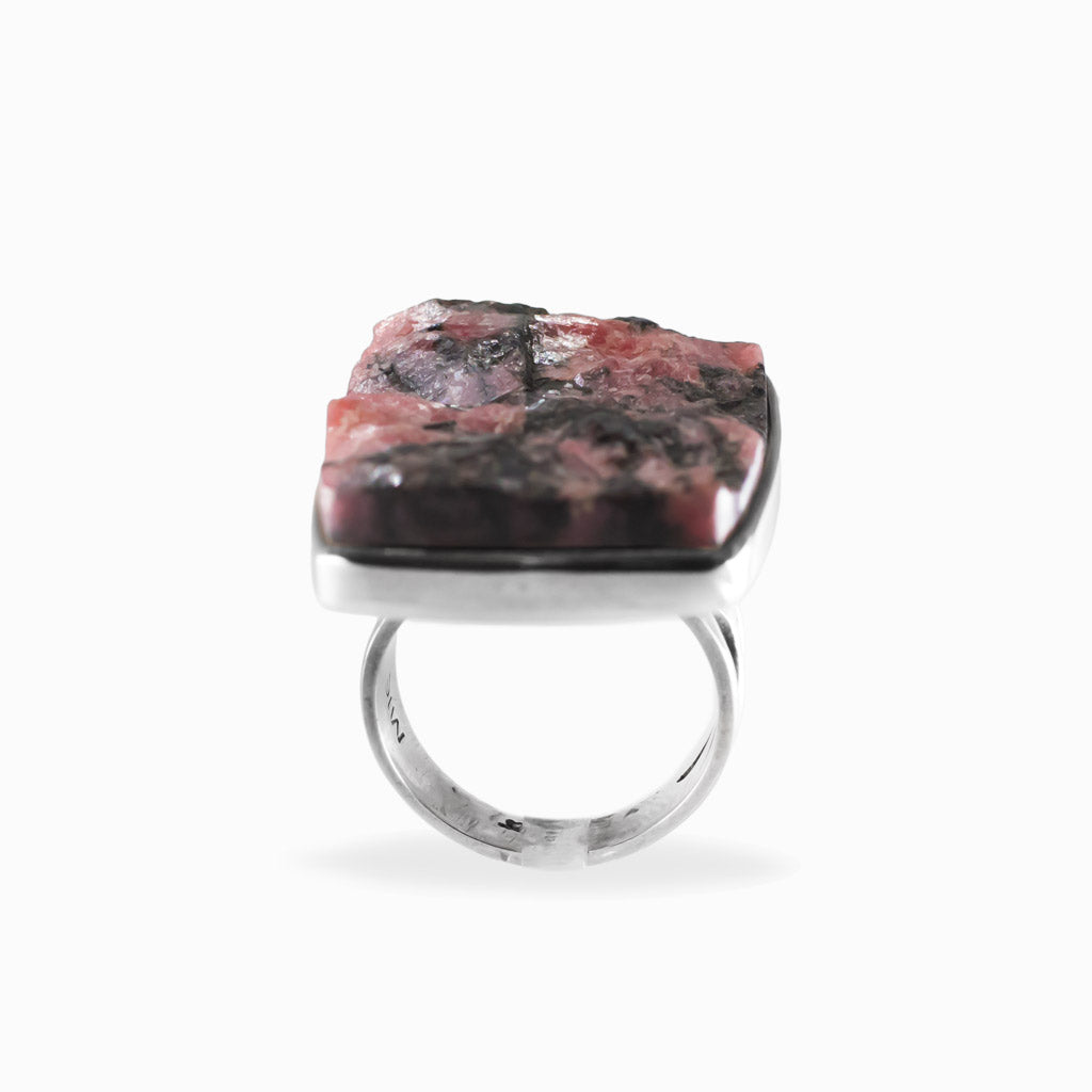 Rectangular freeform Rhodonite ring with natural pink and black mineral patterning set in polished 925 sterling silver.