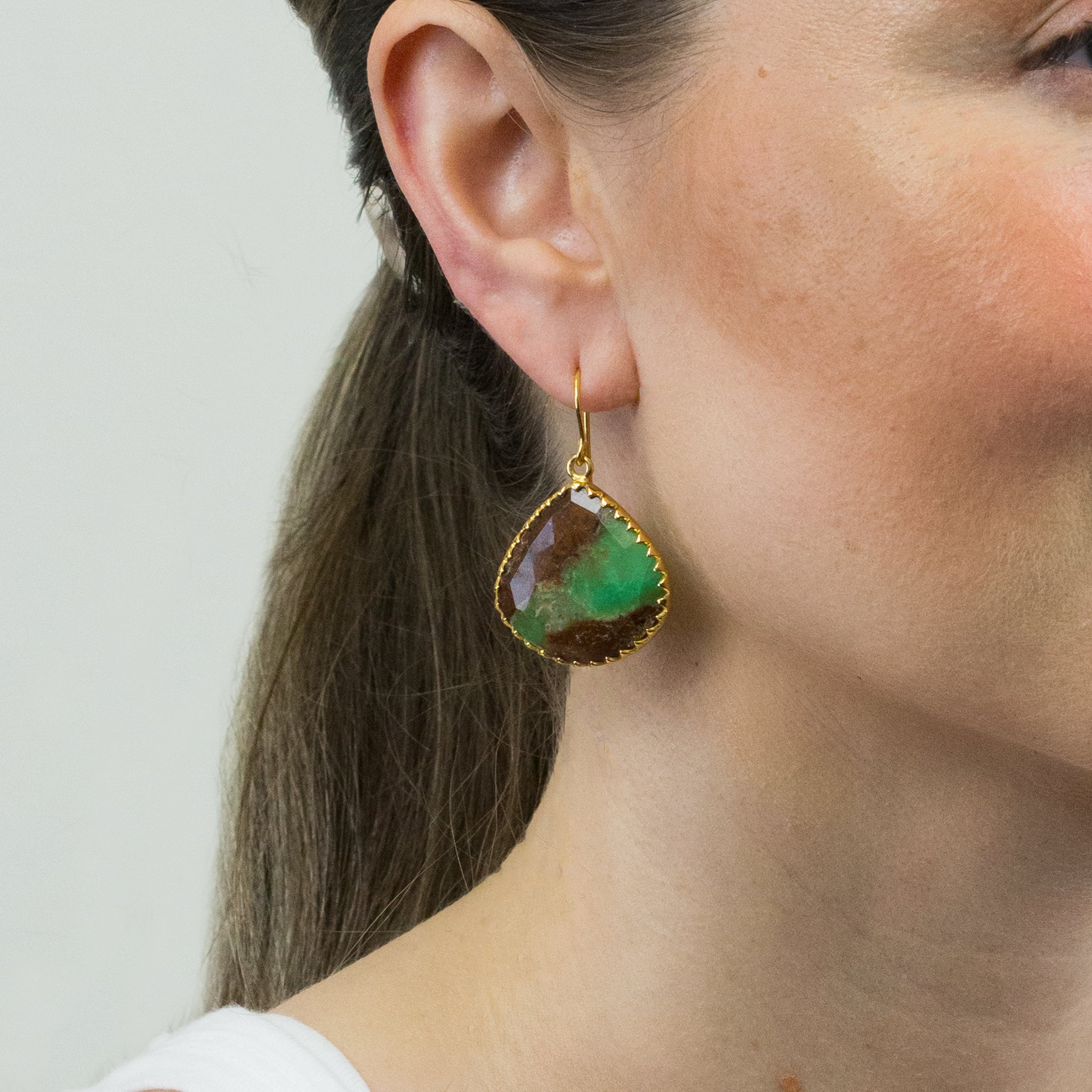 Chrysoprase in Matrix earrings with gold vermeil finish on model