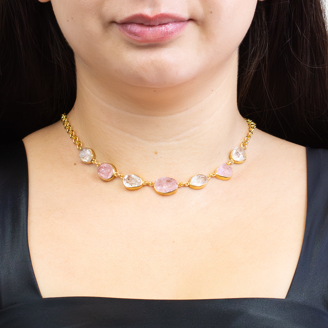 Raw Morganite and Herkimer Diamond multistone necklace in yellow gold vermeil with organic pink and clear crystals on model. | MADE IN EARTH 