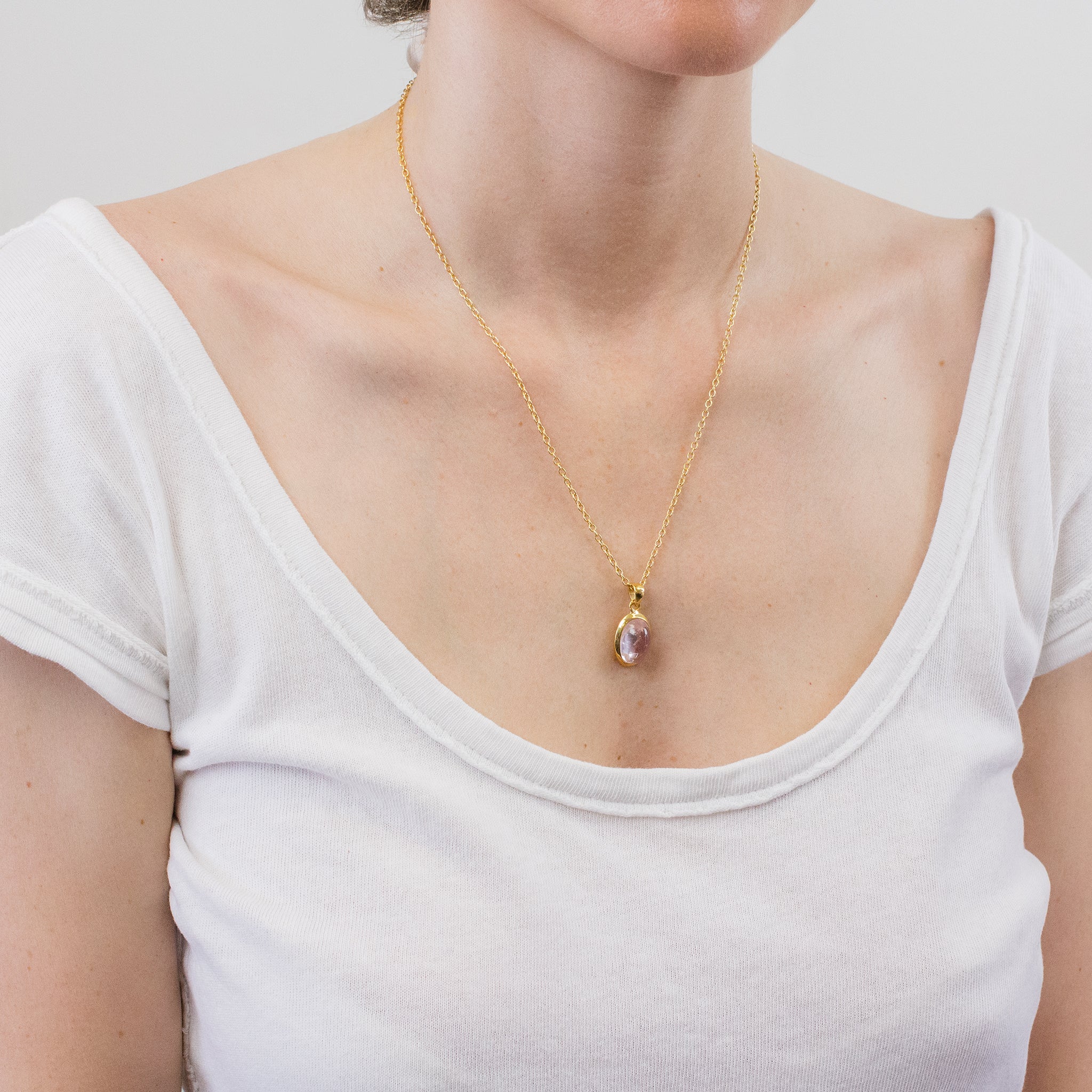 KUNZITE CAB NECKLACE WITH GOLD VERMEIL FINISH ON MODEL