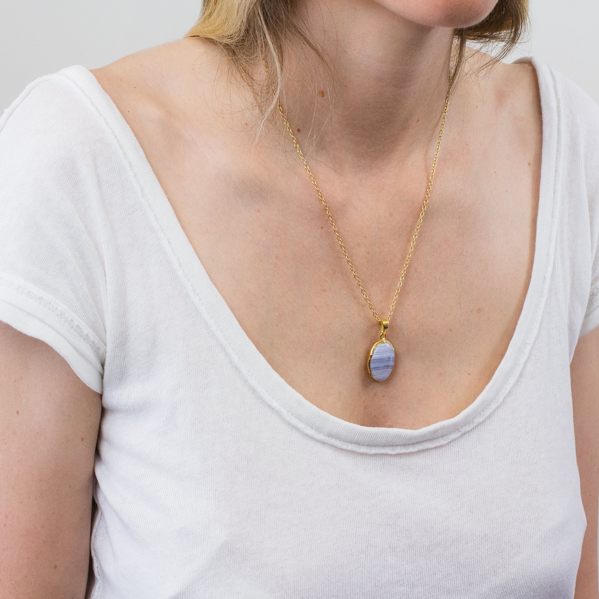 BLUE LACE AGATE NECKLACE WITH GOLD VERMEIL FINISH ON MODEL