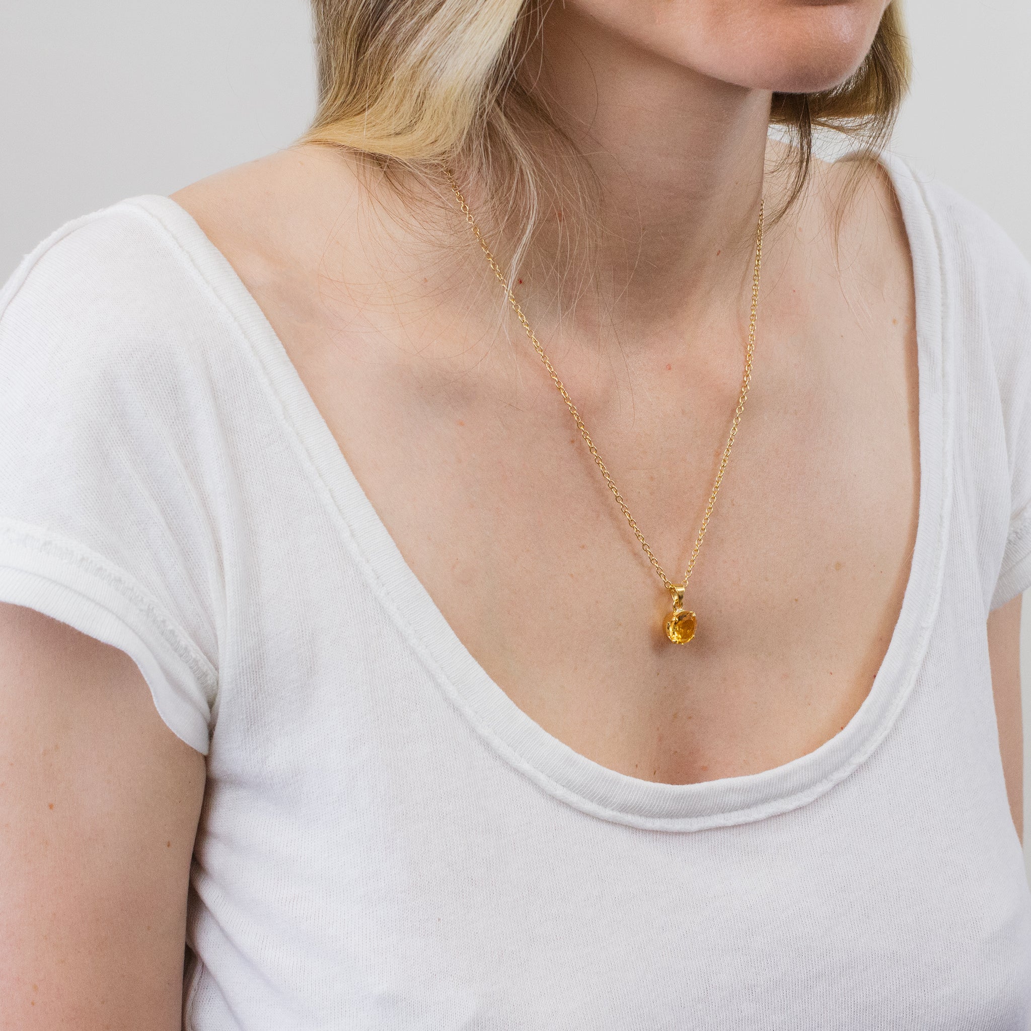 FACETED CITRINE NECKLACE WITH 14K YELLOW GOLD VERMEIL FINISH ON MODEL