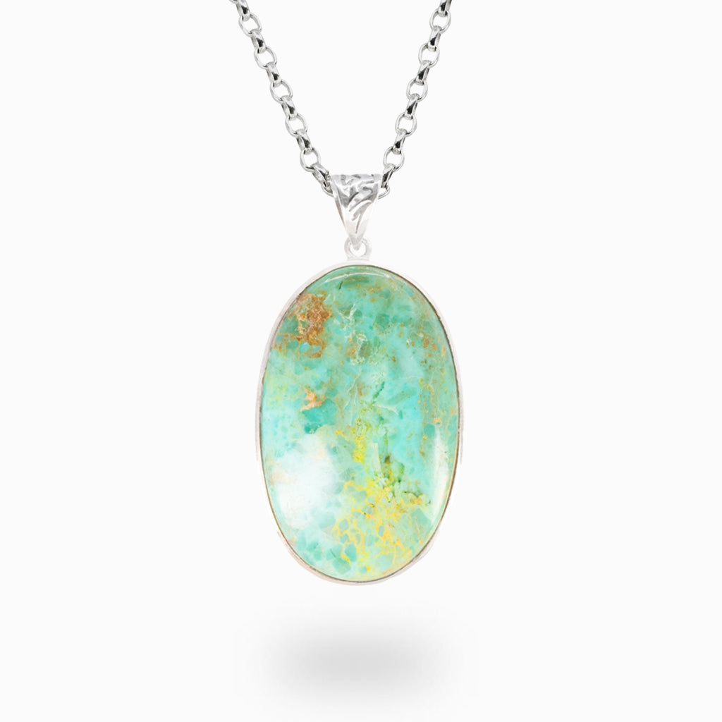 Oval Campo Frio Turquoise pendant necklace in sterling silver featuring natural blue-green gemstone.