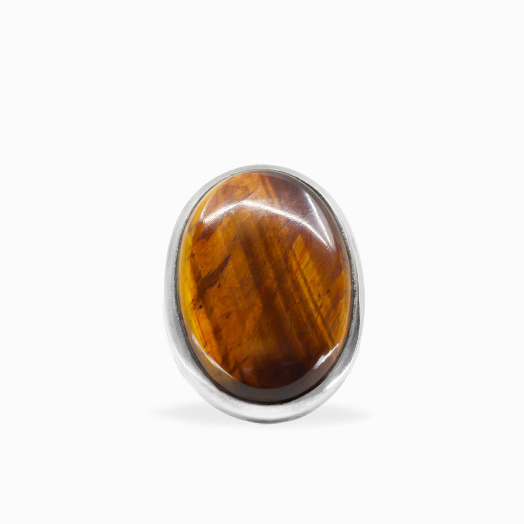Golden-brown oval Tiger's Eye cabochon ring with natural chatoyancy set in polished 925 sterling silver.