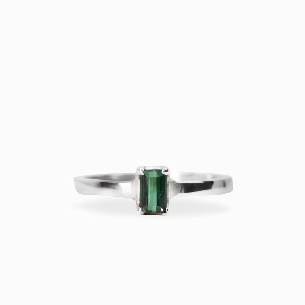 Elongated rectangular faceted Green Tourmaline ring in polished 925 sterling silver with a four-prong setting.