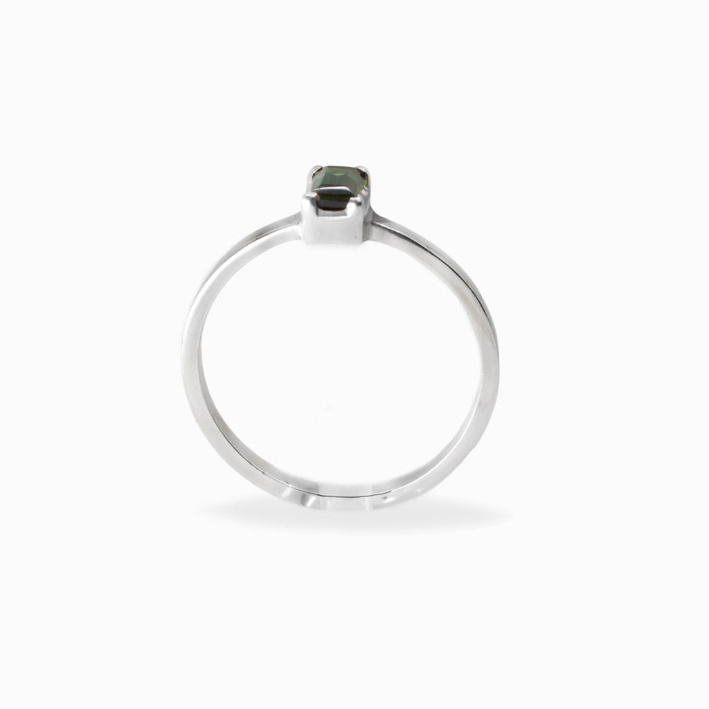 Elongated rectangular faceted Green Tourmaline ring in polished 925 sterling silver with a four-prong setting.