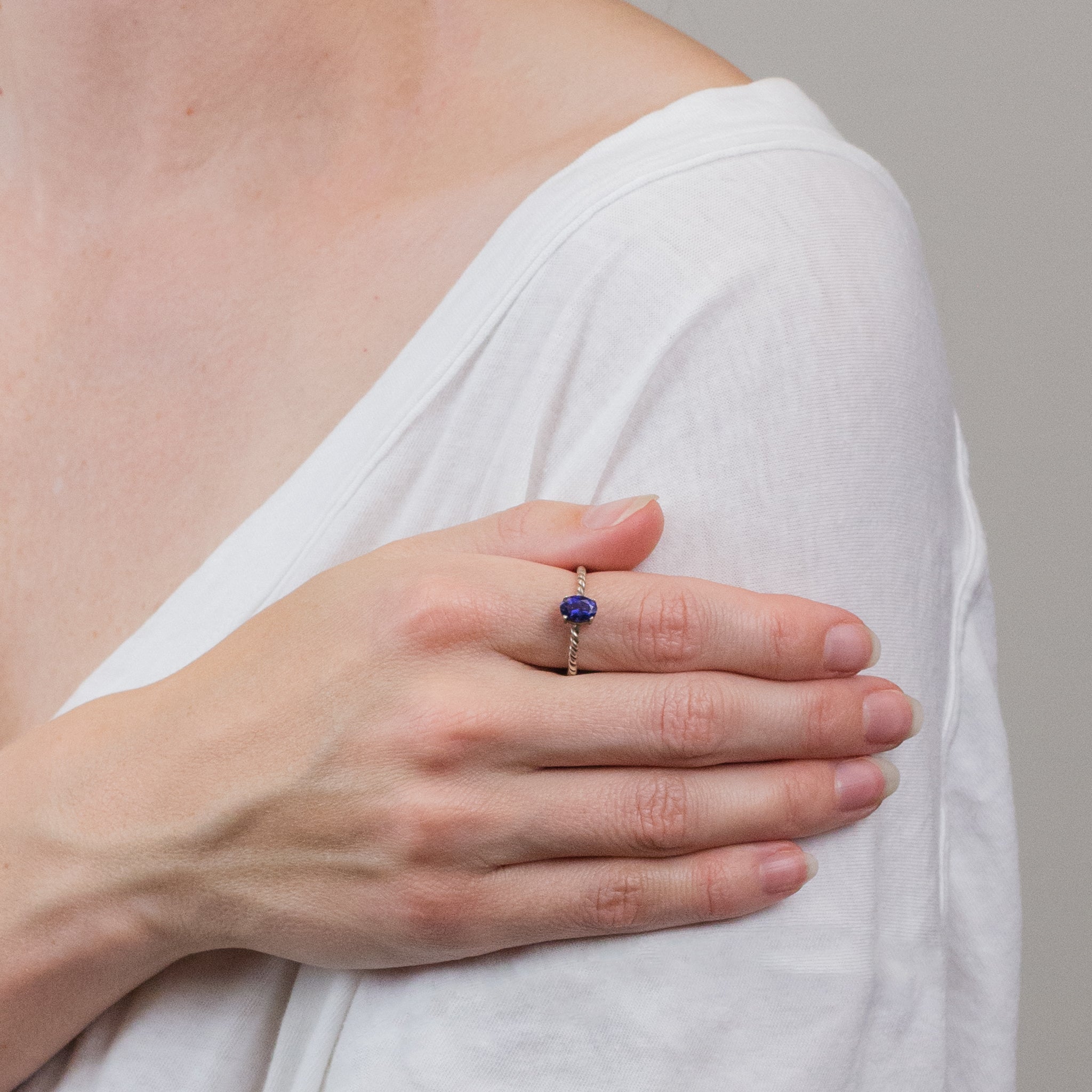 FACETED IOLITE RING ON MODEL