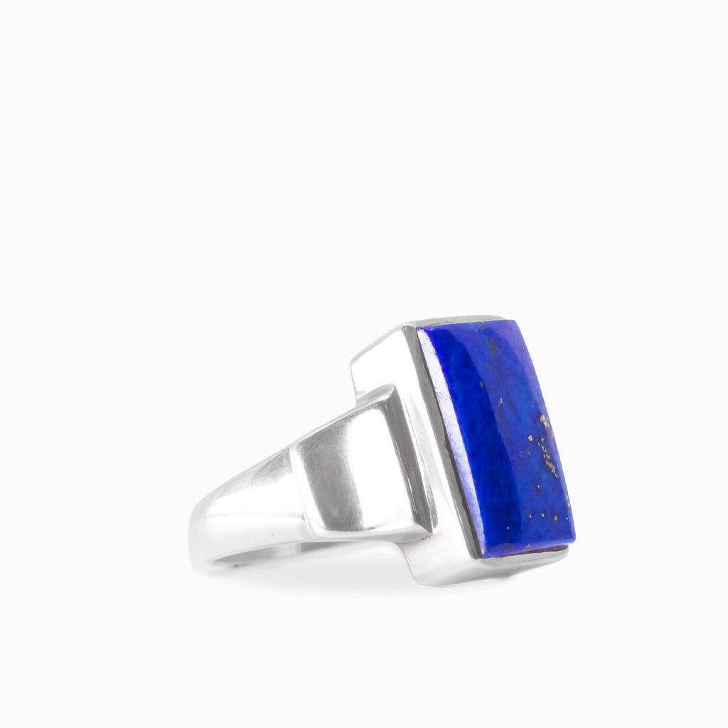 Rectangular royal blue Lapis Lazuli with natural gold-tone flecks set in a polished 925 sterling silver ring.