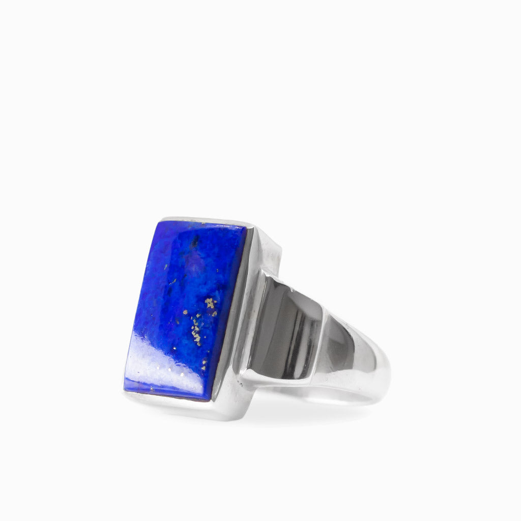 Rectangular royal blue Lapis Lazuli with natural gold-tone flecks set in a polished 925 sterling silver ring.