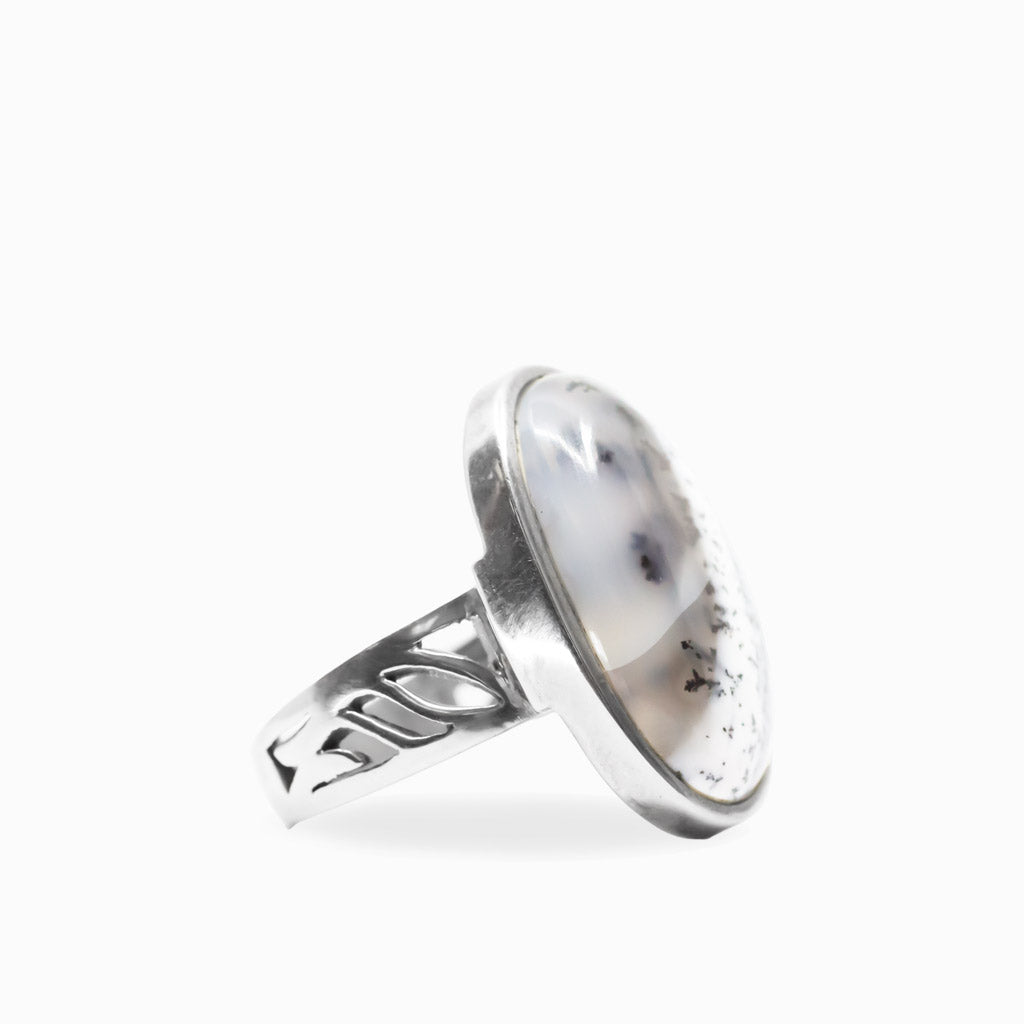 Oval Dendritic Opal cabochon with black branch-like inclusions set in polished 925 sterling silver.