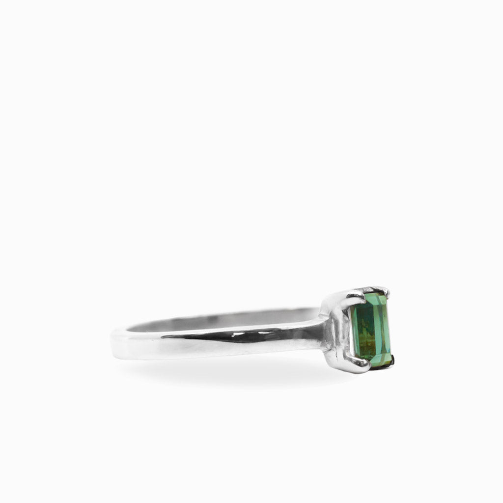 Elongated rectangular faceted Green Tourmaline ring in polished 925 sterling silver with a four-prong setting.