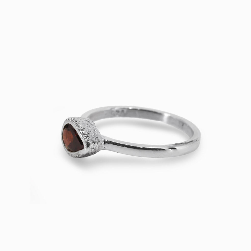 Faceted Teardrop Garnet Ring with Hammered Silver Made In Earth