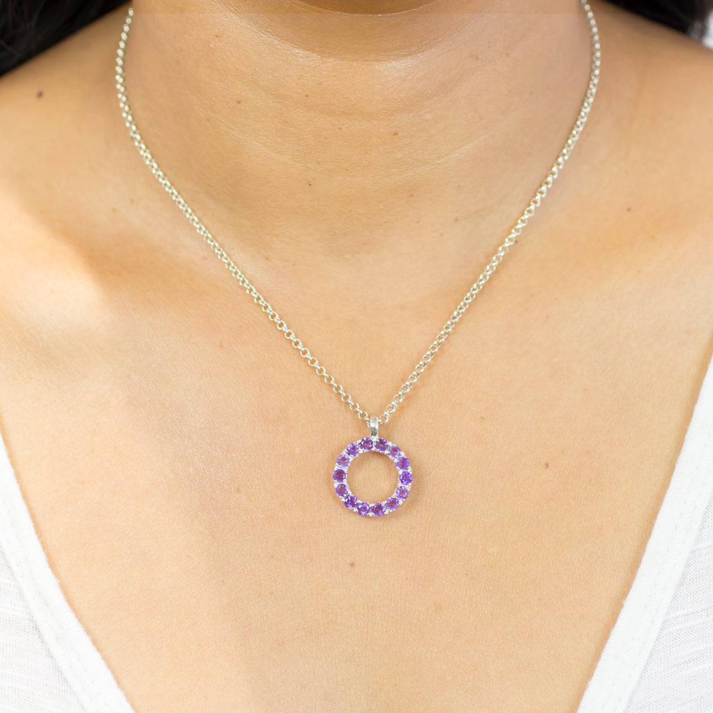 ROUND PURPLE FACETED MULTI STONE STERLING SILVER AMETHYST NECKLACE ON MODEL