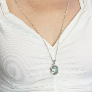 Model Wearing Light blue Oval Aquamarine Necklace Made in Earth