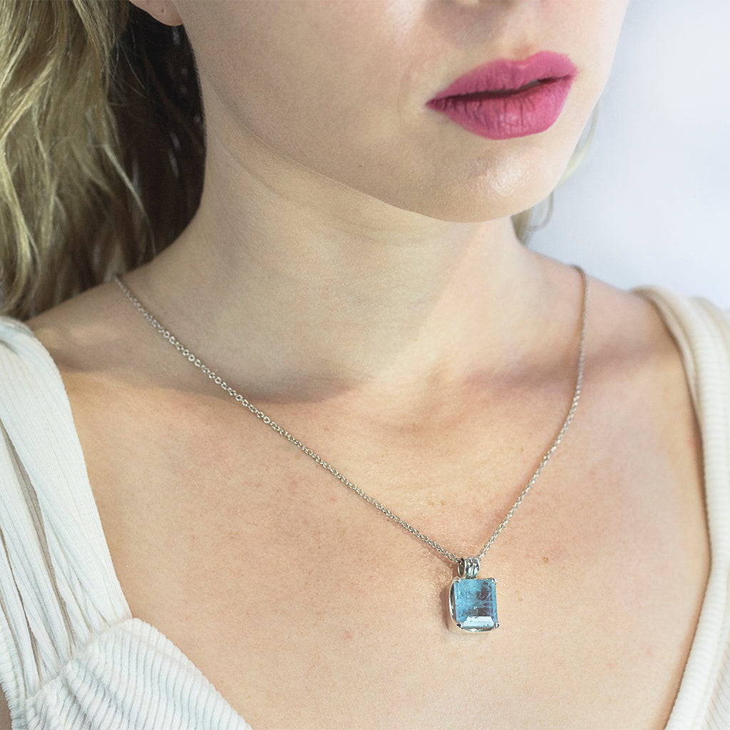 Light blue square faceted Aquamarine necklace on model