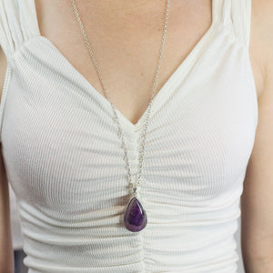 Model Wearing Purple Teardrop Cabochon Auralite 23 Necklace