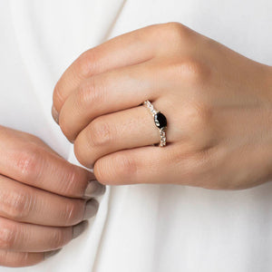 Model Wearing Onyx & White Topaz Ring