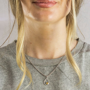 Model wearing faceted Citrine Birthstone Necklace in Sterling Silver Made In Earth